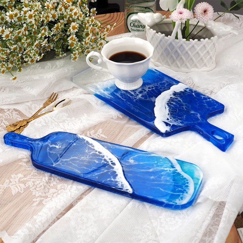 http://craftoutlet.com.au/cdn/shop/products/Cheese-Board-Epoxy-Resin-Silicone-Mould-Serving-Board-with-Handle-3.jpg?v=1684783931